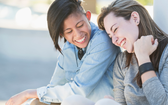 Two girls smiling